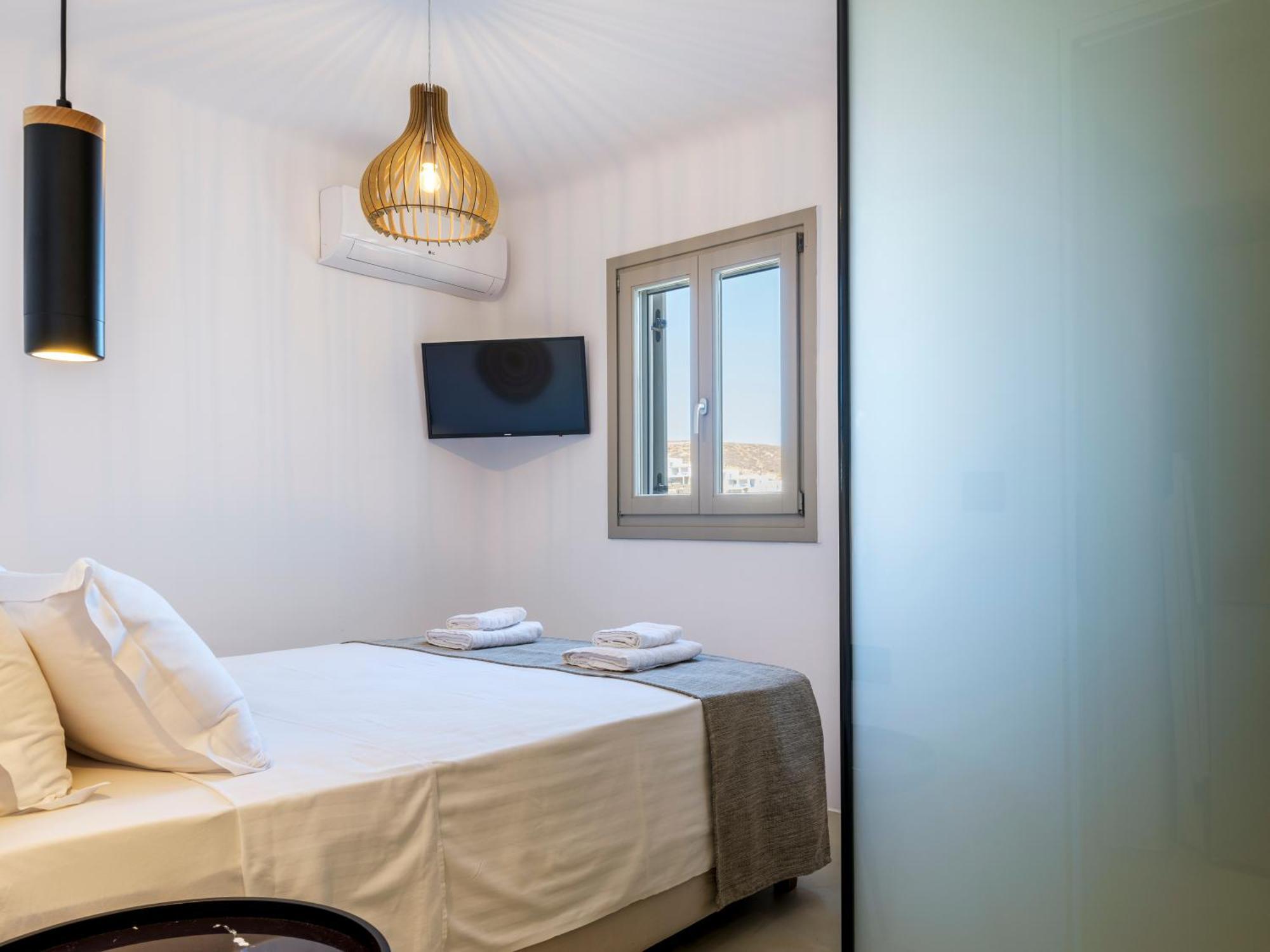 The Mykonist Merchia Beach Villas & Suites Exterior photo